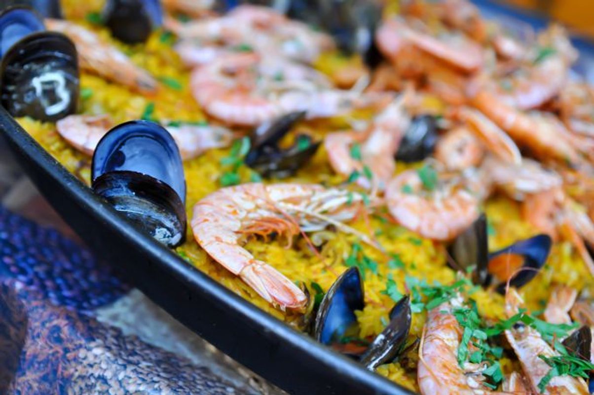 shutterstock_98270666 Spanish Paella Close Up with Shrimp and Clams