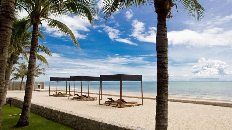 Strand med cabanas