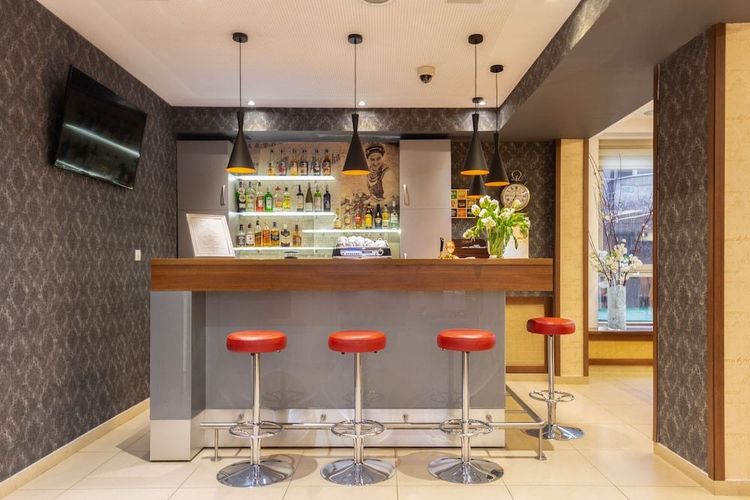På Poleczki Residence Apartments kan du njuta av en drink i baren efter en lång dag i Warszawa.