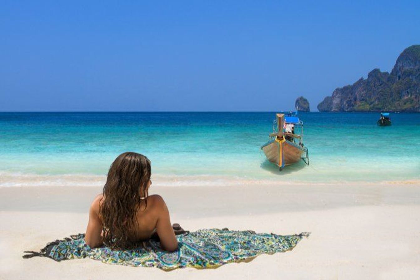 Hvide sandstrande og azurblåt hav i Thailand