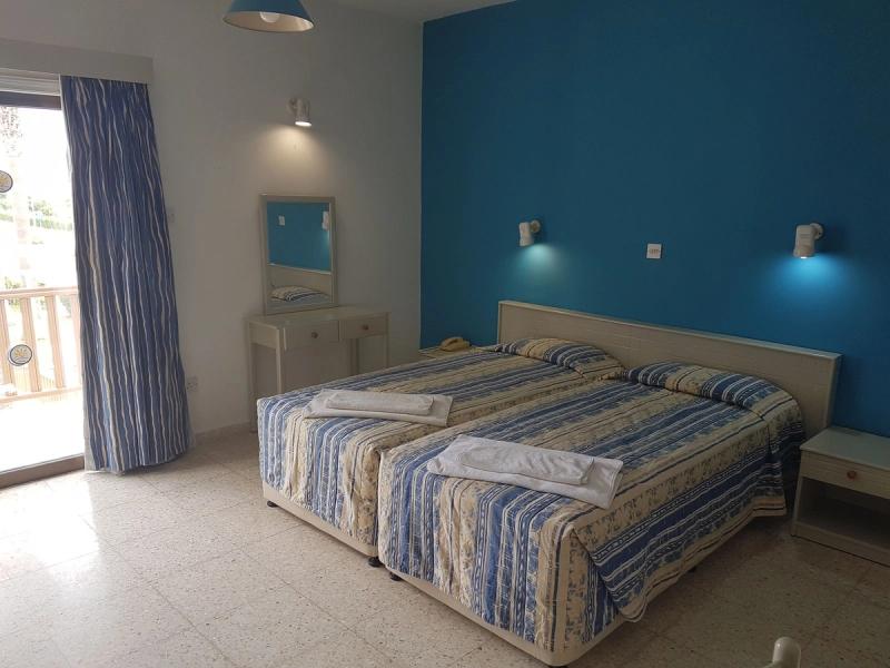 Cosmelenia Hotel & Apartments - Image 3