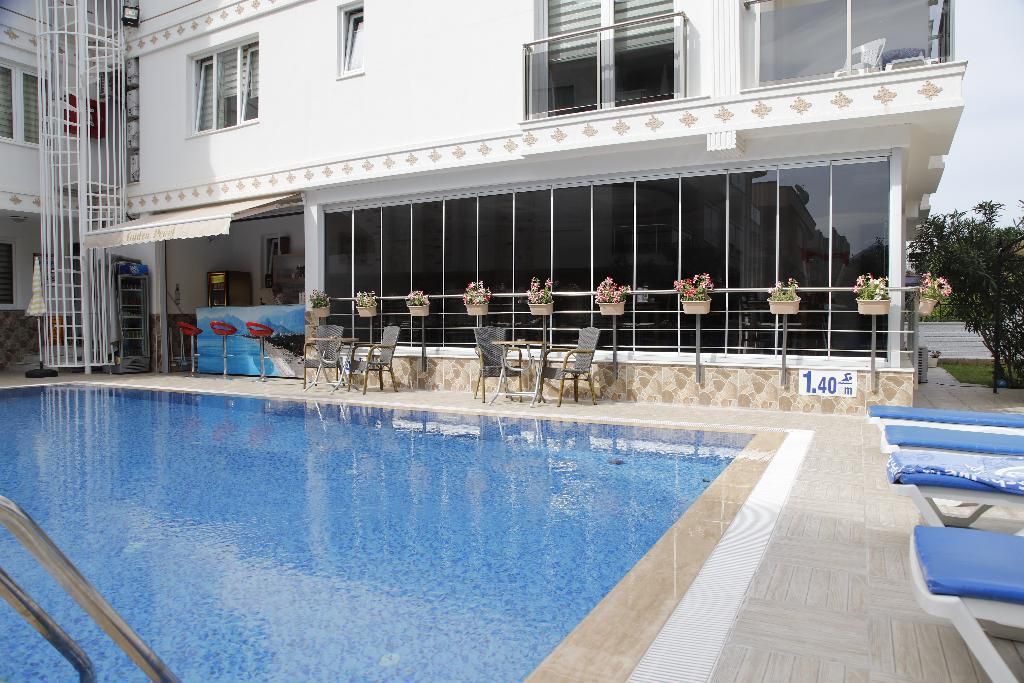 Güden Pearl Apart Hotel er et leilighetshotell med basseng og bar som ligger i Antalya.