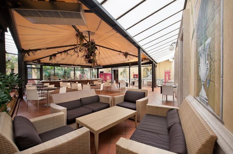 På Best Western Ai Cavalieri Hotel kan du nyte en rolig stund i vinterhagen.