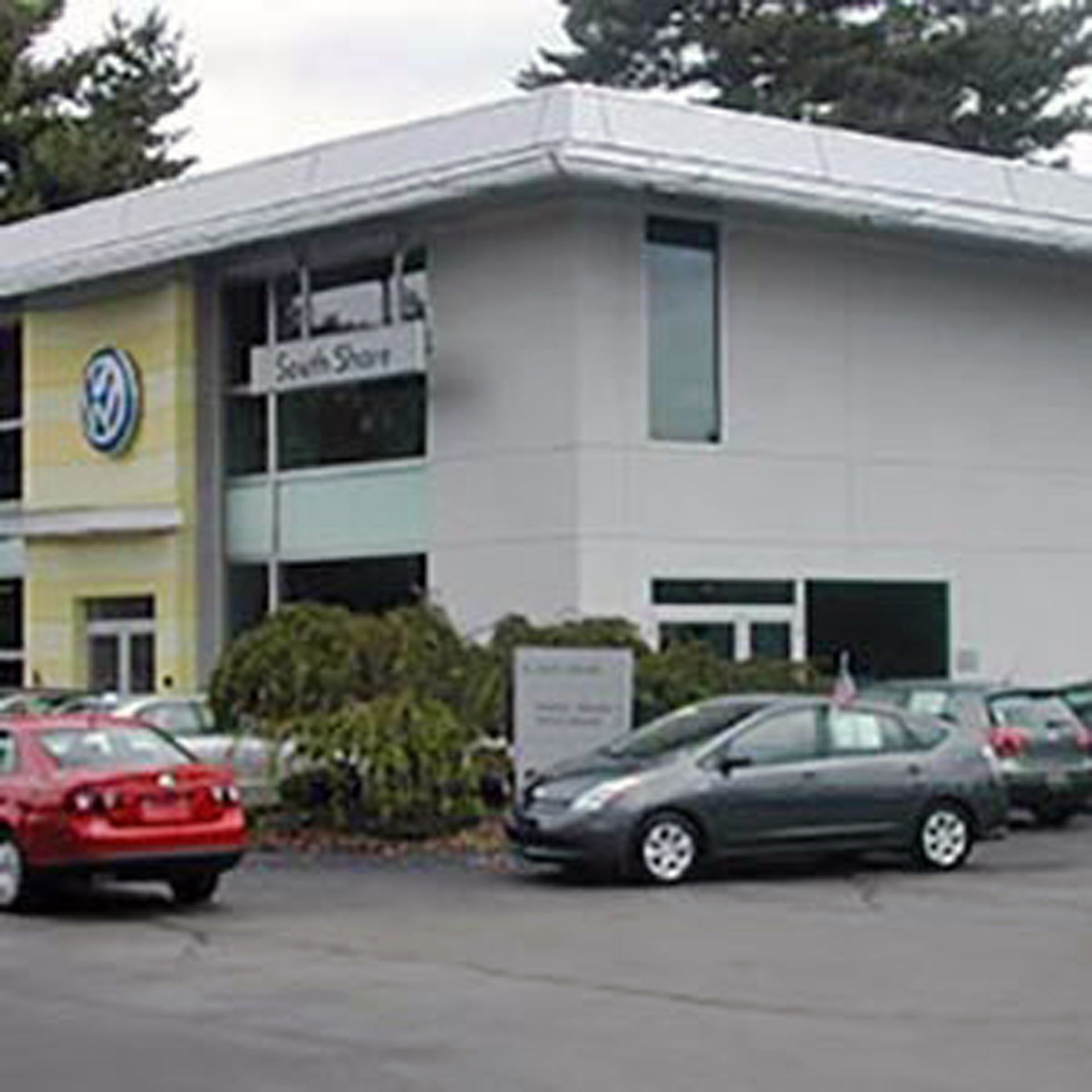 Nelson Painting is a painting company that provides exterior house painting, shown here after a vw dealership south shore project