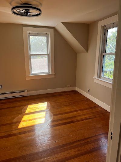 Nelson Painting is a third-generation painting business that provides interior painting, shown here after a bedroom taupe walls dormer ceiling project