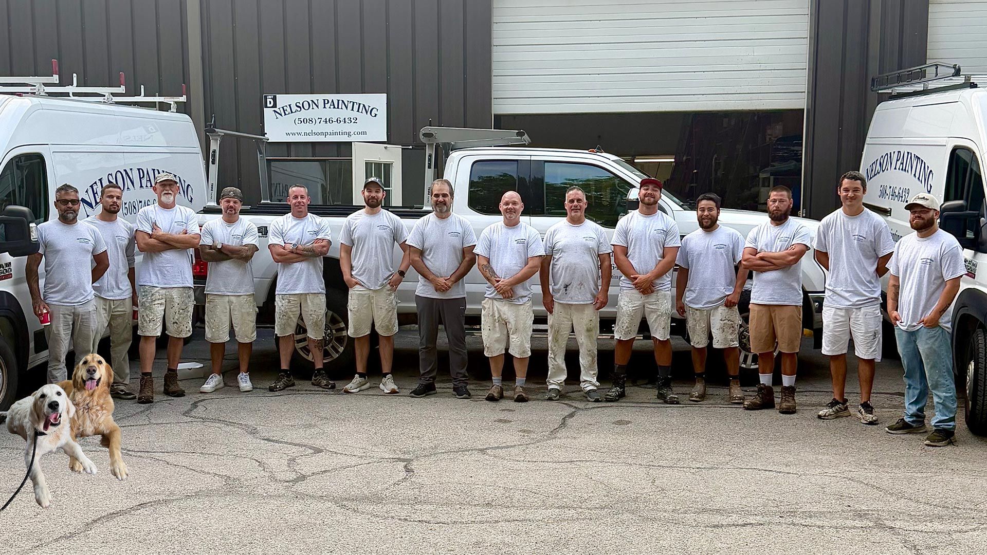 Nelson Painting is a family-owned painting contractor that provides residential and commercial painting in Plymouth, MA The Nelson Painting crew in company shirts lined up outside their Plymouth, MA shop with the company work vans