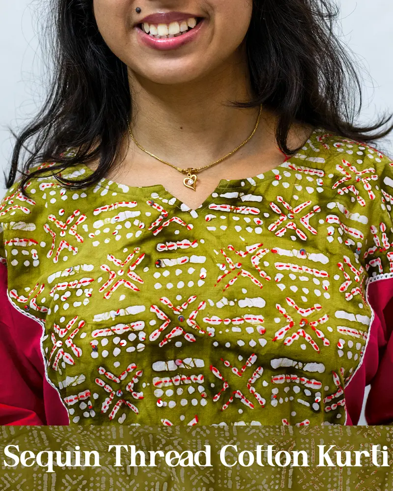 Woman wearing pink sequin thread cotton kurti styled for daily elegance