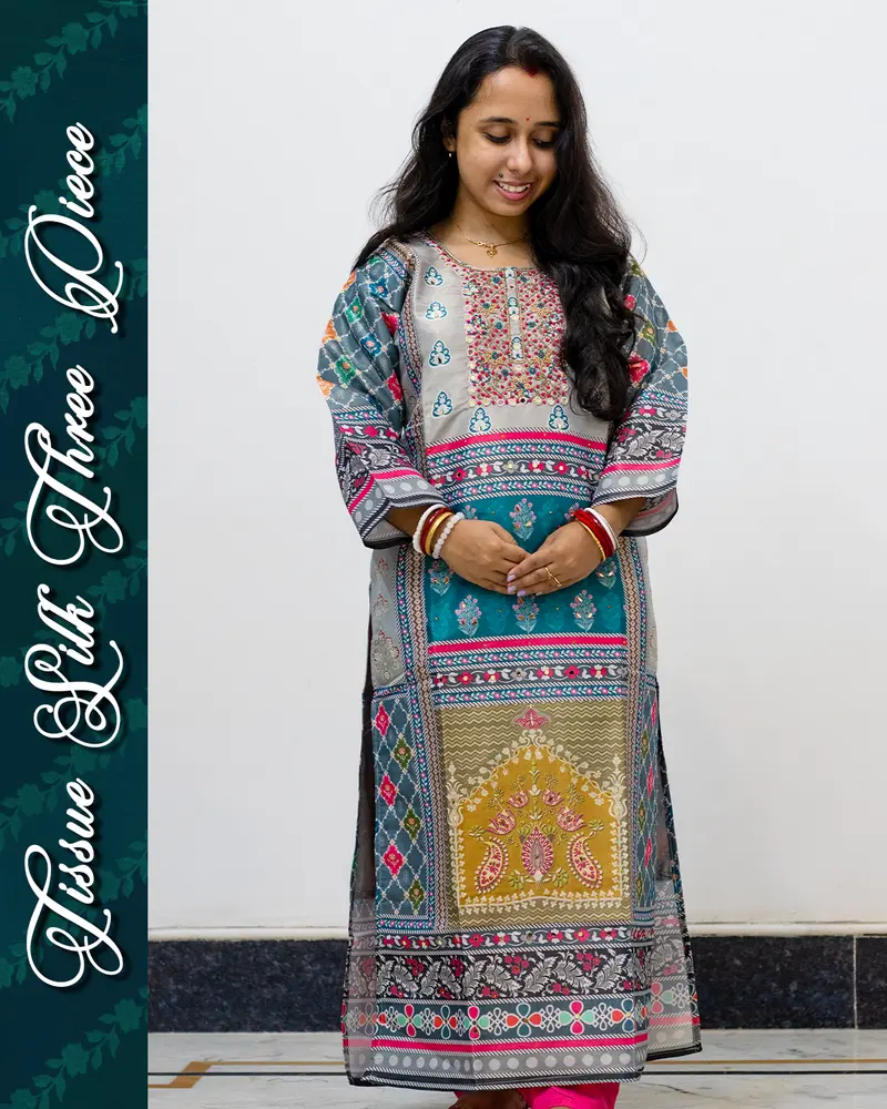 Model wearing Tissue Silk Three Piece Set with mirror work and dupatta