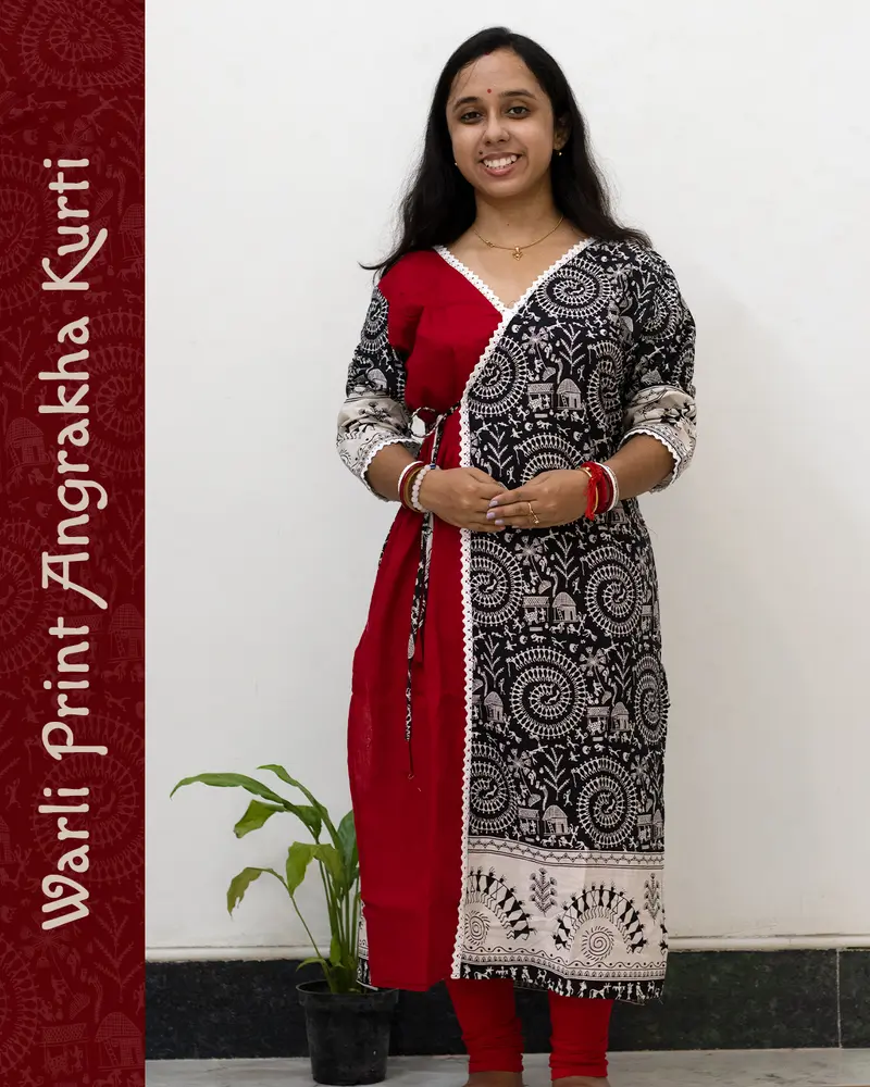 Woman wearing Warli Print Angrakha Kurti with lace detailing and side pockets