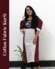 Woman wearing cotton kurti with Malayalam character print, puff sleeves, side pocket, thread work, and hand-painted yoke design – SutiSaaj.