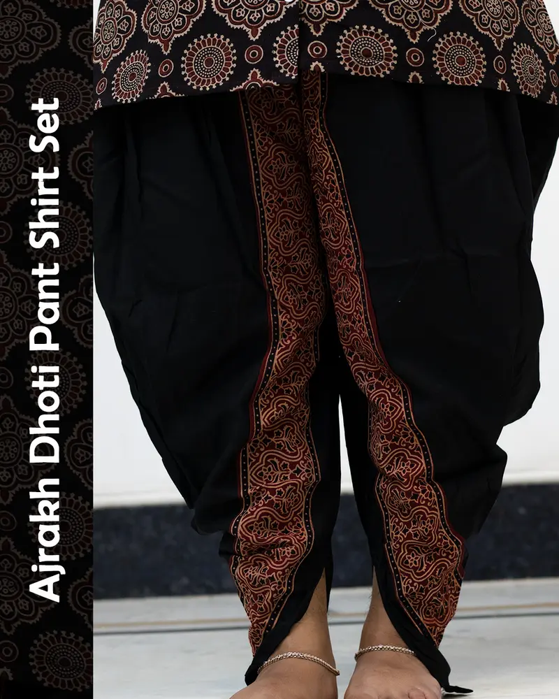 Woman wearing Ajrakh Dhoti Pant Shirt Set with printed shirt and black dhoti pants