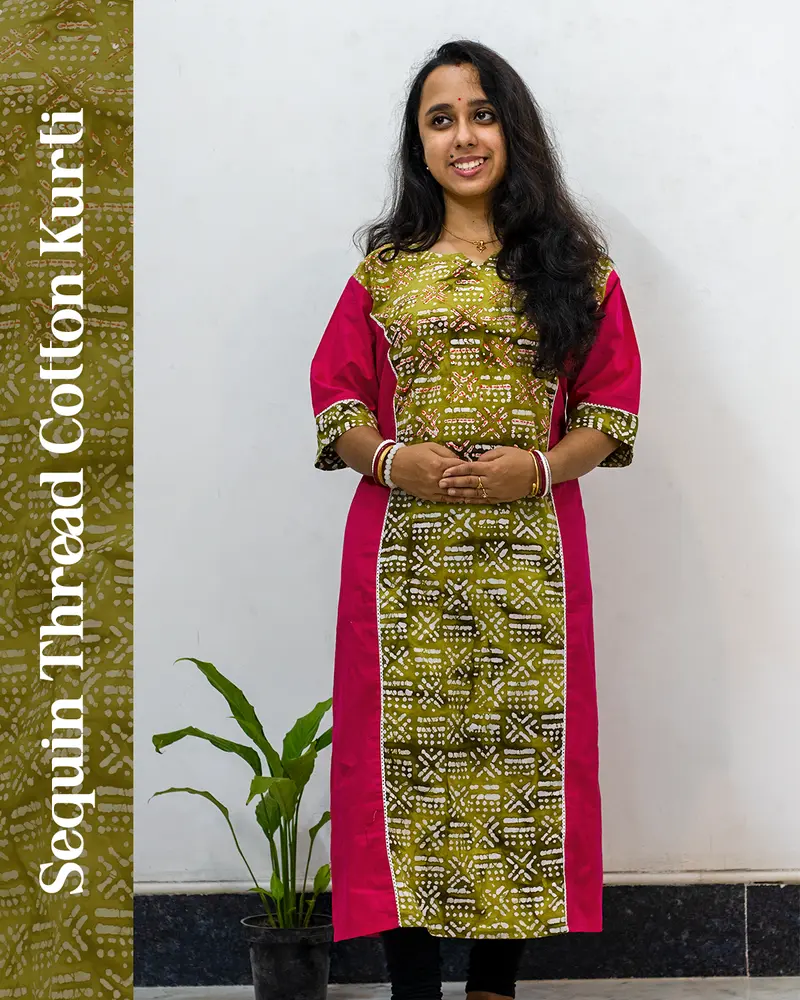 Woman wearing pink sequin thread cotton kurti styled for daily elegance