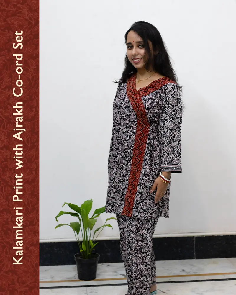 Woman wearing pure cotton Kalamkari print co-ord set with Ajrakh work and Angrakha pattern from SutiSaaj.