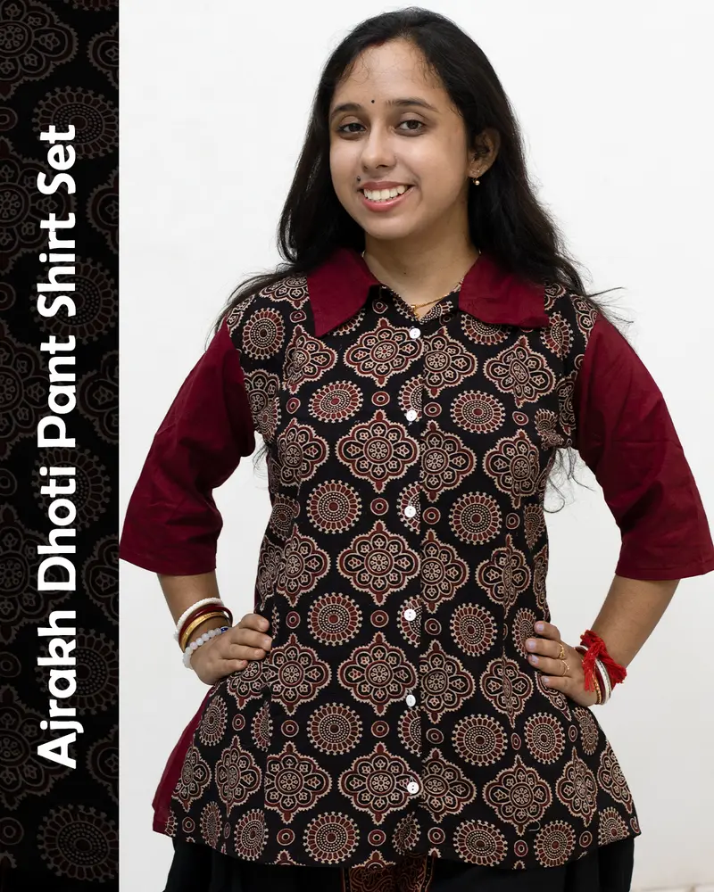 Woman wearing Ajrakh Dhoti Pant Shirt Set with printed shirt and black dhoti pants
