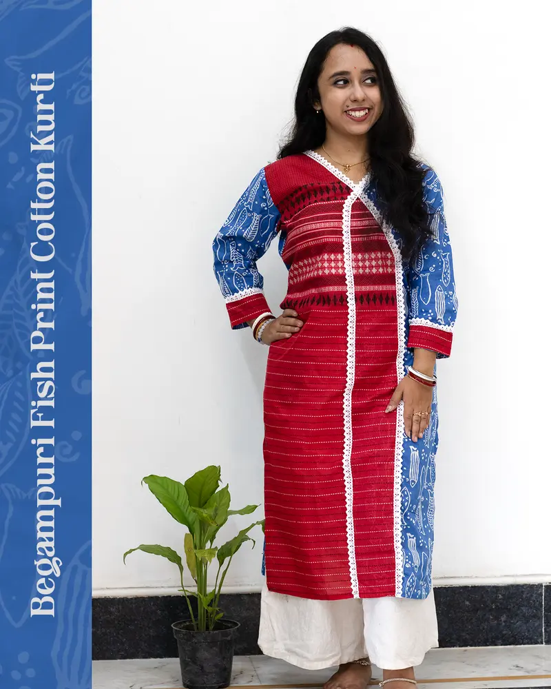 Woman wearing red and blue Begampuri cotton kurti with fish print, mismatch design, lace details, stylish neckline, cuffs, and side pocket – SutiSaaj.