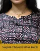 Woman wearing pink sequin thread cotton kurti styled for daily elegance