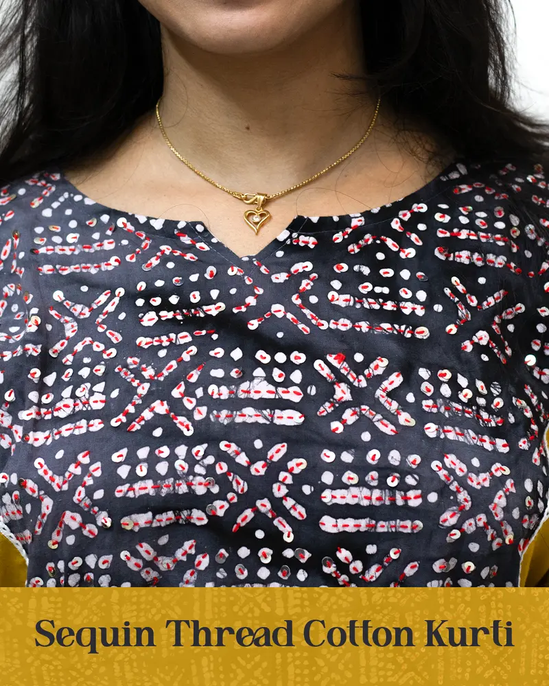 Woman wearing pink sequin thread cotton kurti styled for daily elegance