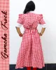Gamcha frock with floral embroidery and puffed sleeves