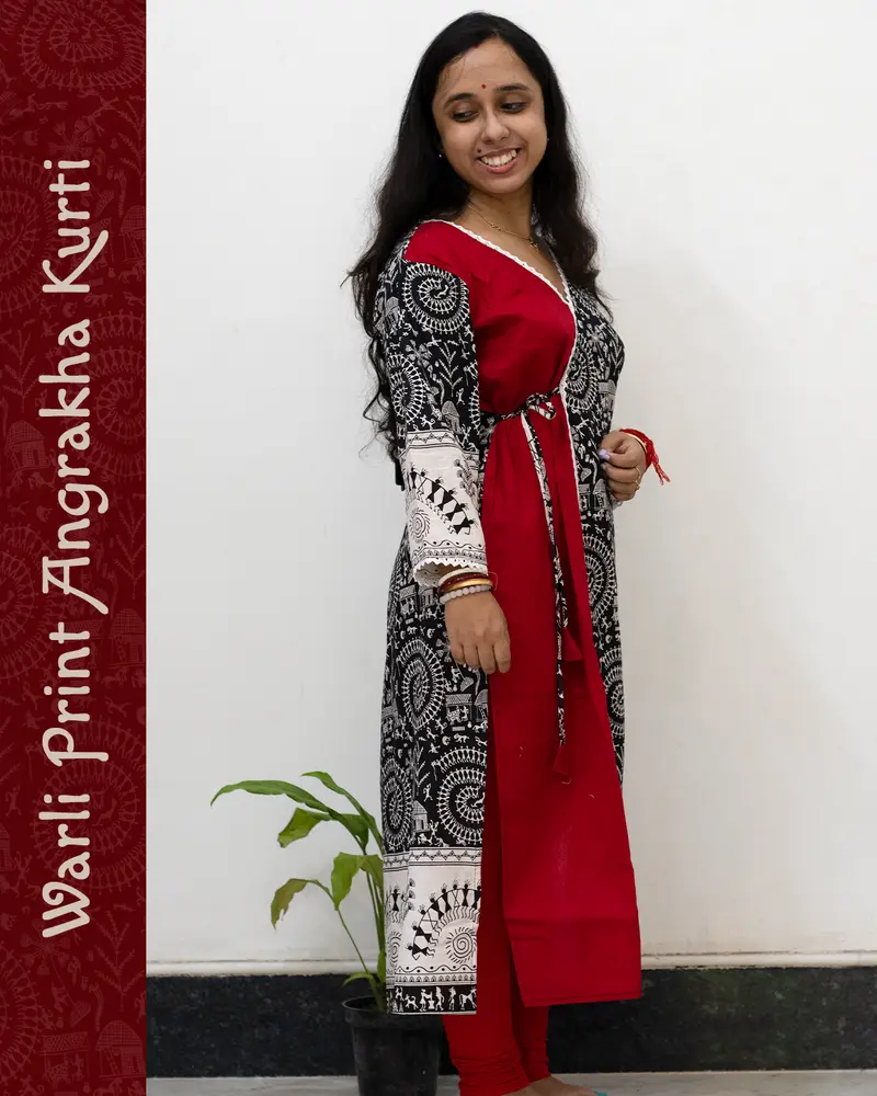 Woman wearing Warli Print Angrakha Kurti with lace detailing and side pockets