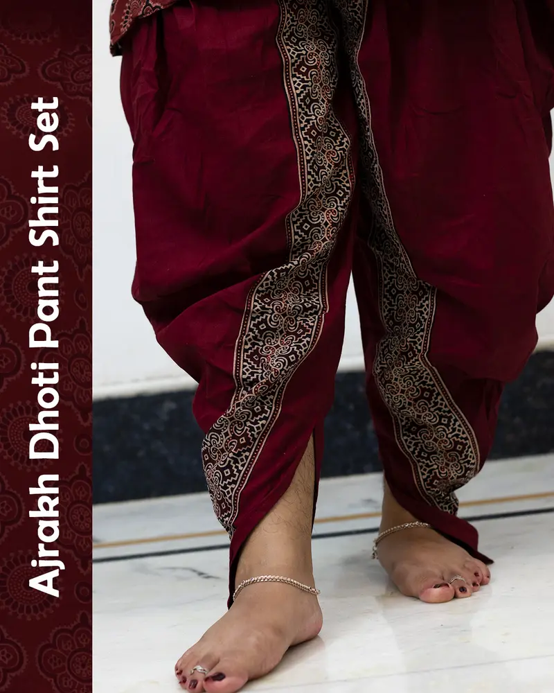 Woman wearing Ajrakh Dhoti Pant Shirt Set with printed shirt and black dhoti pants