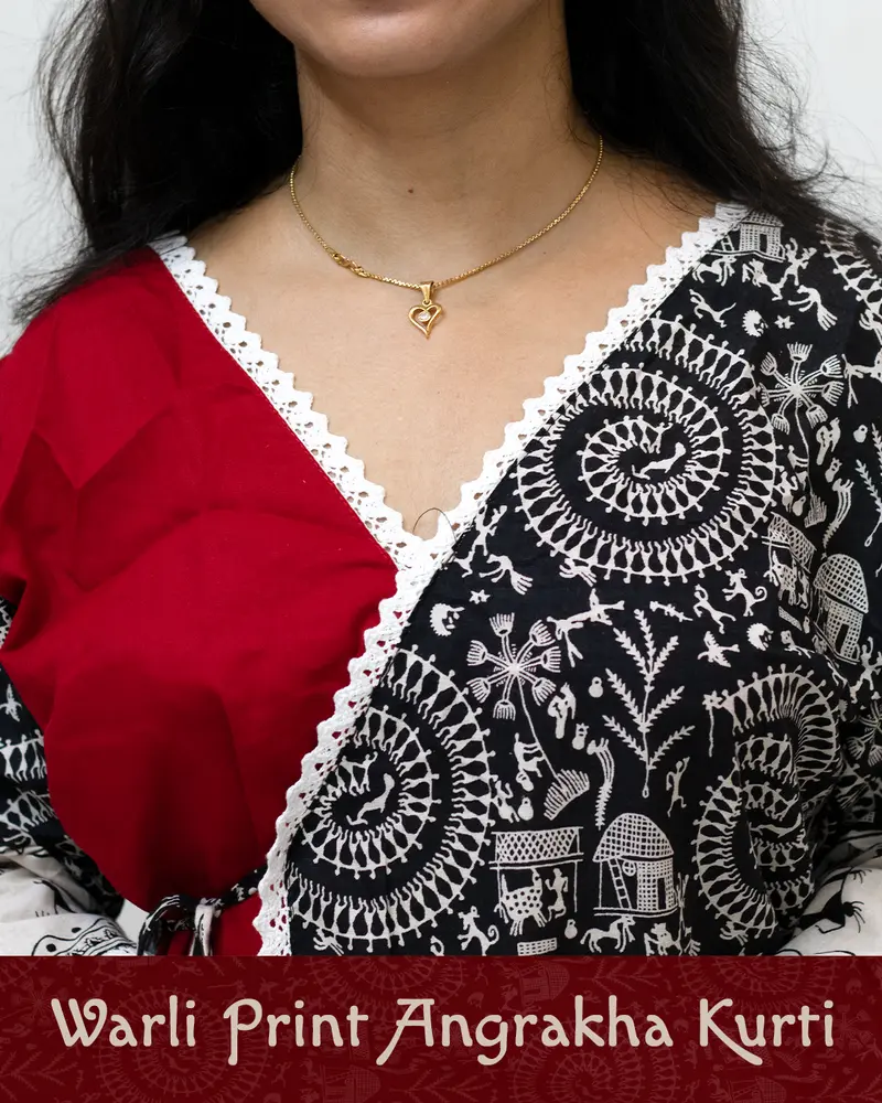 Woman wearing Warli Print Angrakha Kurti with lace detailing and side pockets
