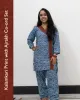 Woman wearing pure cotton Kalamkari print co-ord set with Ajrakh work and Angrakha pattern from SutiSaaj.