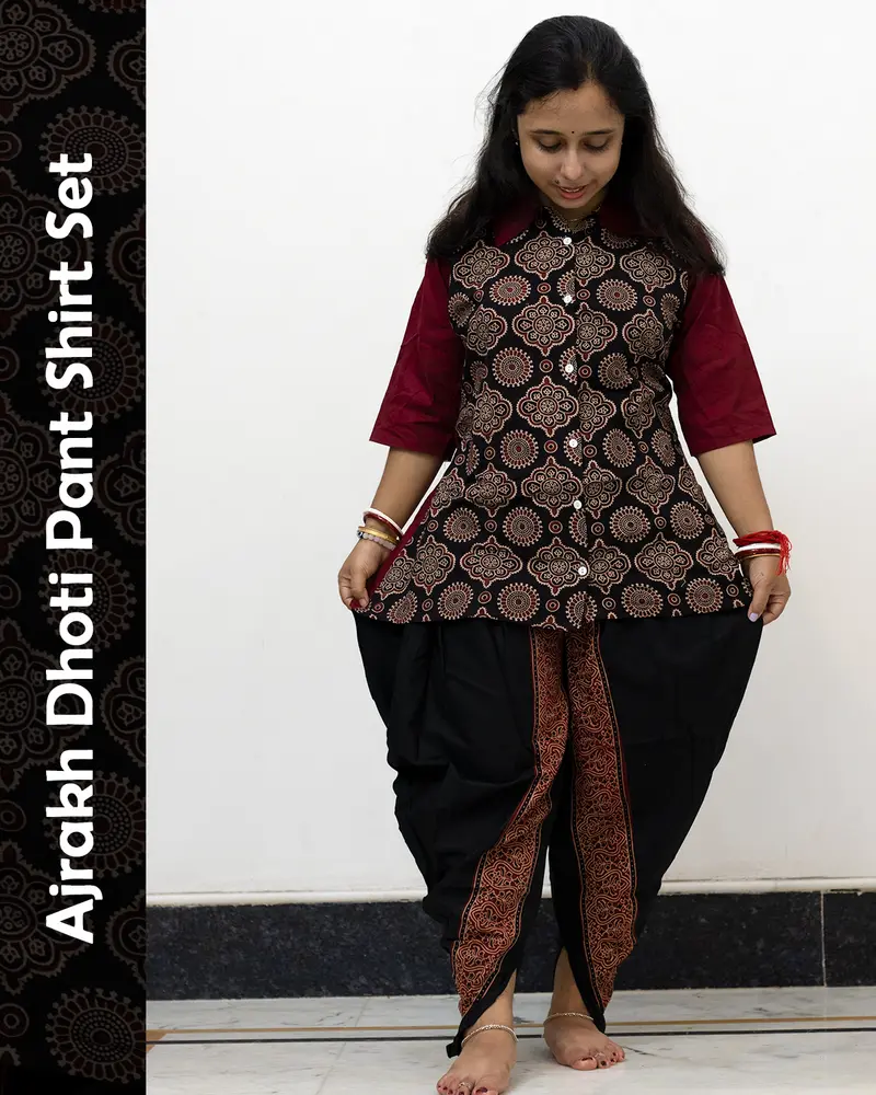 Woman wearing Ajrakh Dhoti Pant Shirt Set with printed shirt and black dhoti pants