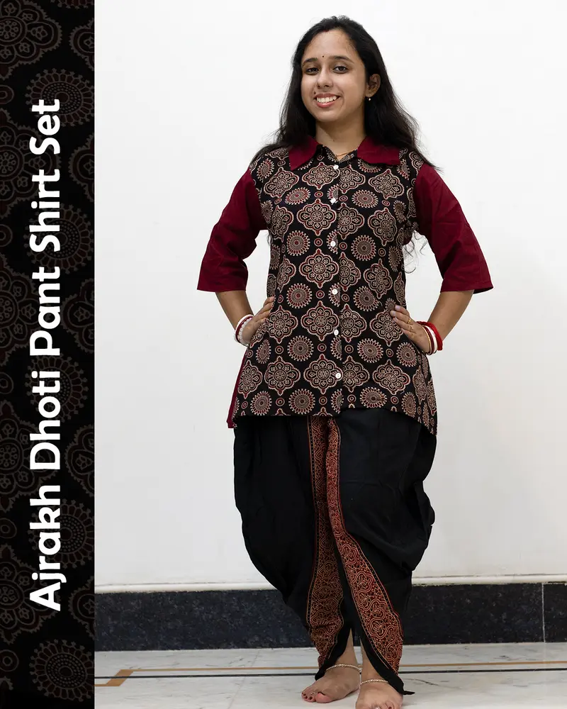 Woman wearing Ajrakh Dhoti Pant Shirt Set with printed shirt and black dhoti pants