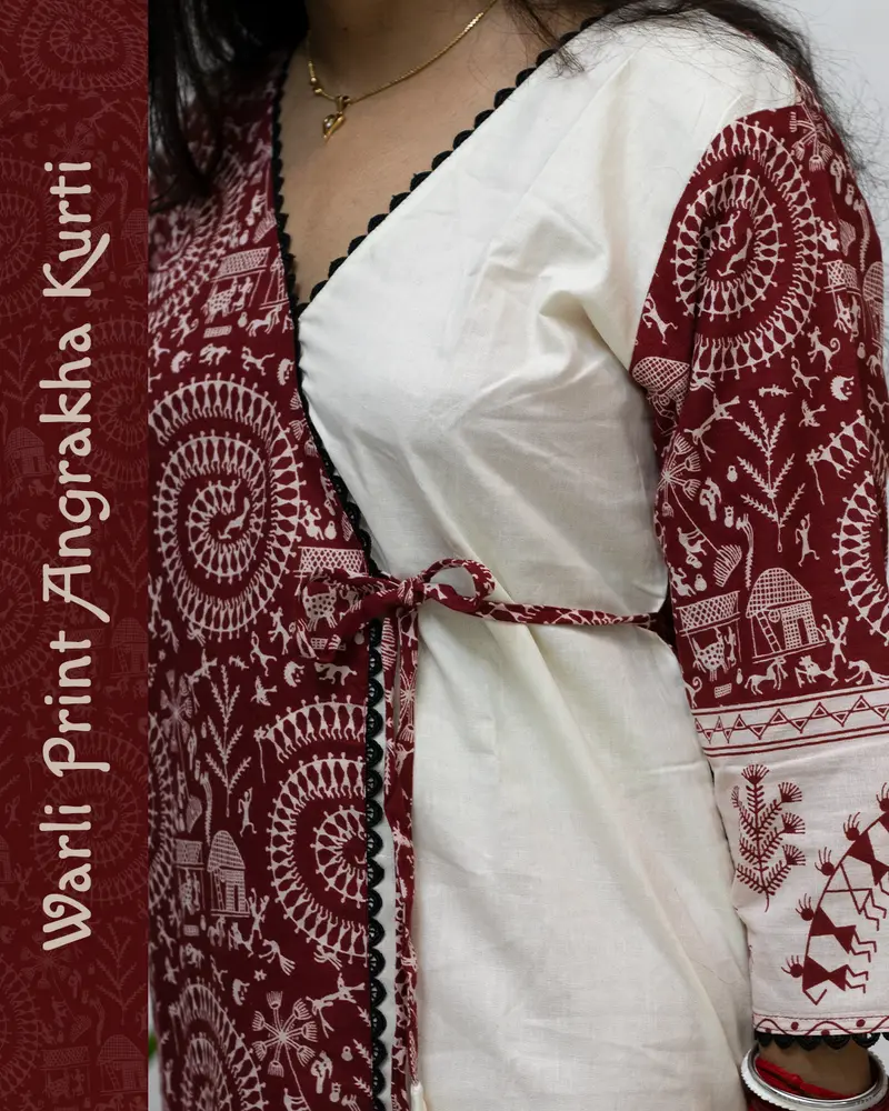 Woman wearing Warli Print Angrakha Kurti with lace detailing and side pockets