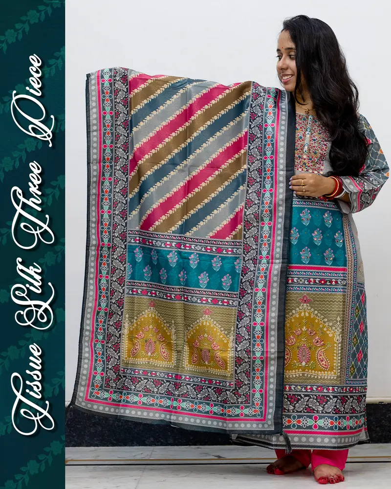 Model wearing Tissue Silk Three Piece Set with mirror work and dupatta
