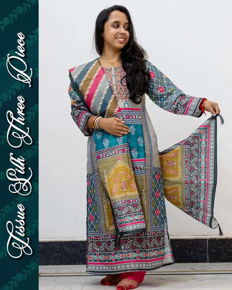 Model wearing Tissue Silk Three Piece Set with mirror work and dupatta