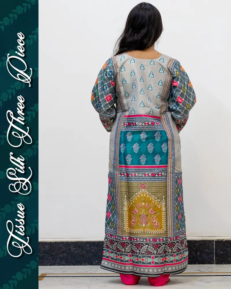 Model wearing Tissue Silk Three Piece Set with mirror work and dupatta