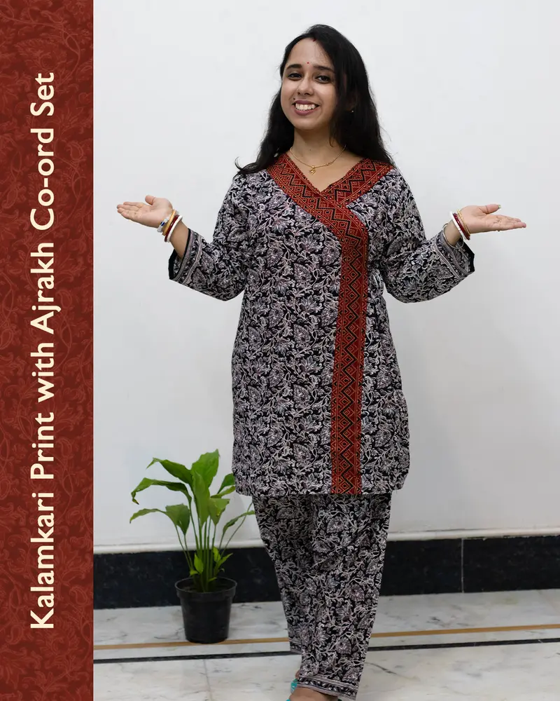 Woman wearing pure cotton Kalamkari print co-ord set with Ajrakh work and Angrakha pattern from SutiSaaj.