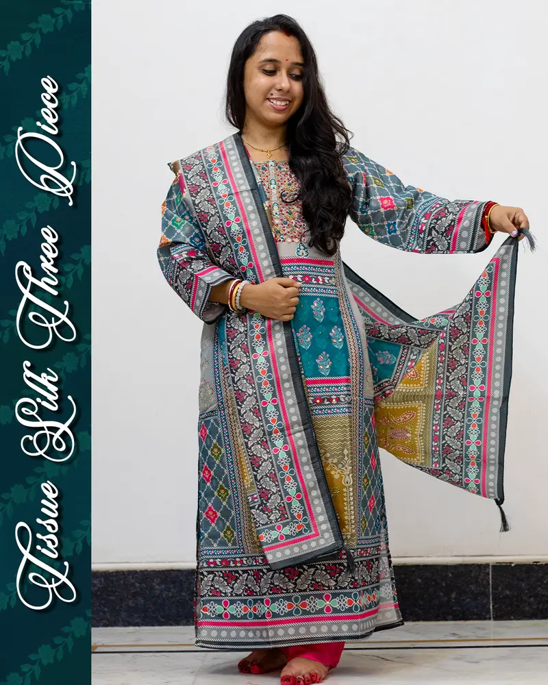 Model wearing Tissue Silk Three Piece Set with mirror work and dupatta