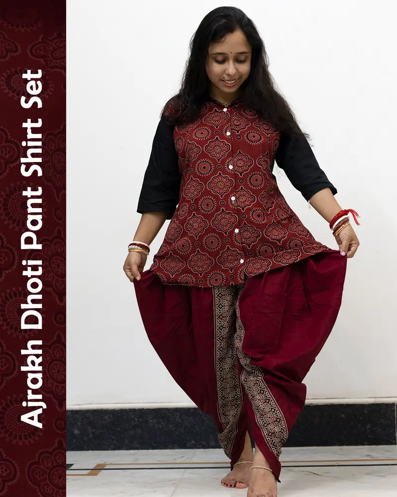 Woman wearing Ajrakh Dhoti Pant Shirt Set with printed shirt and black dhoti pants