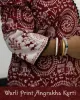 Woman wearing Warli Print Angrakha Kurti with lace detailing and side pockets