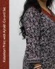 Woman wearing pure cotton Kalamkari print co-ord set with Ajrakh work and Angrakha pattern from SutiSaaj.