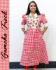 Gamcha frock with floral embroidery and puffed sleeves