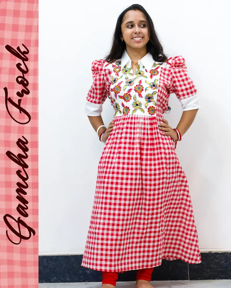 Gamcha frock with floral embroidery and puffed sleeves