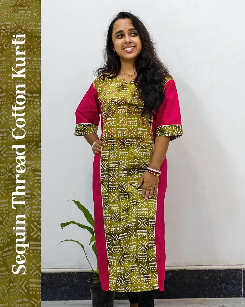 Woman wearing pink sequin thread cotton kurti styled for daily elegance