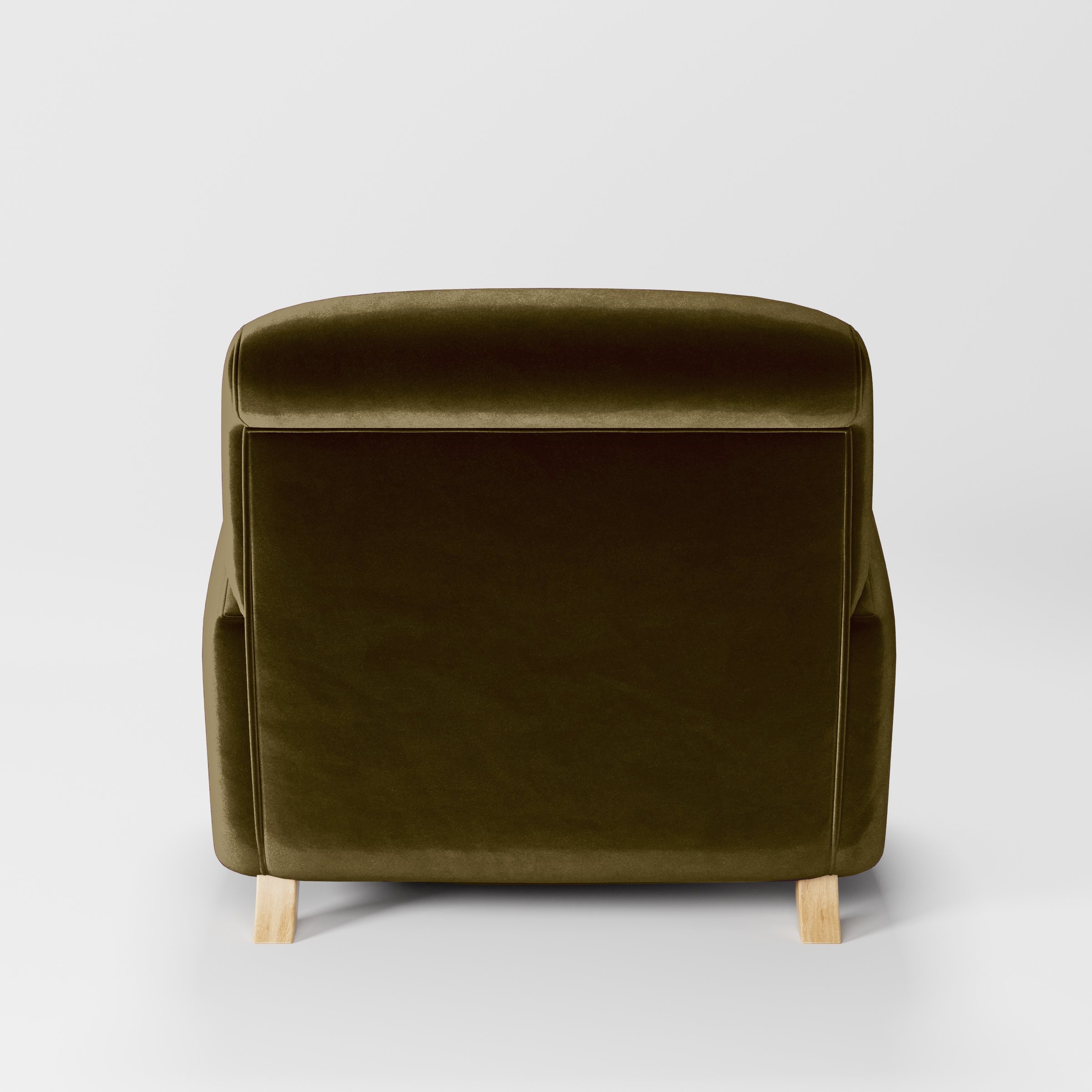 Rear view of the Rye armchair upholstered in Plush EasyClean Velvet in Cedar.