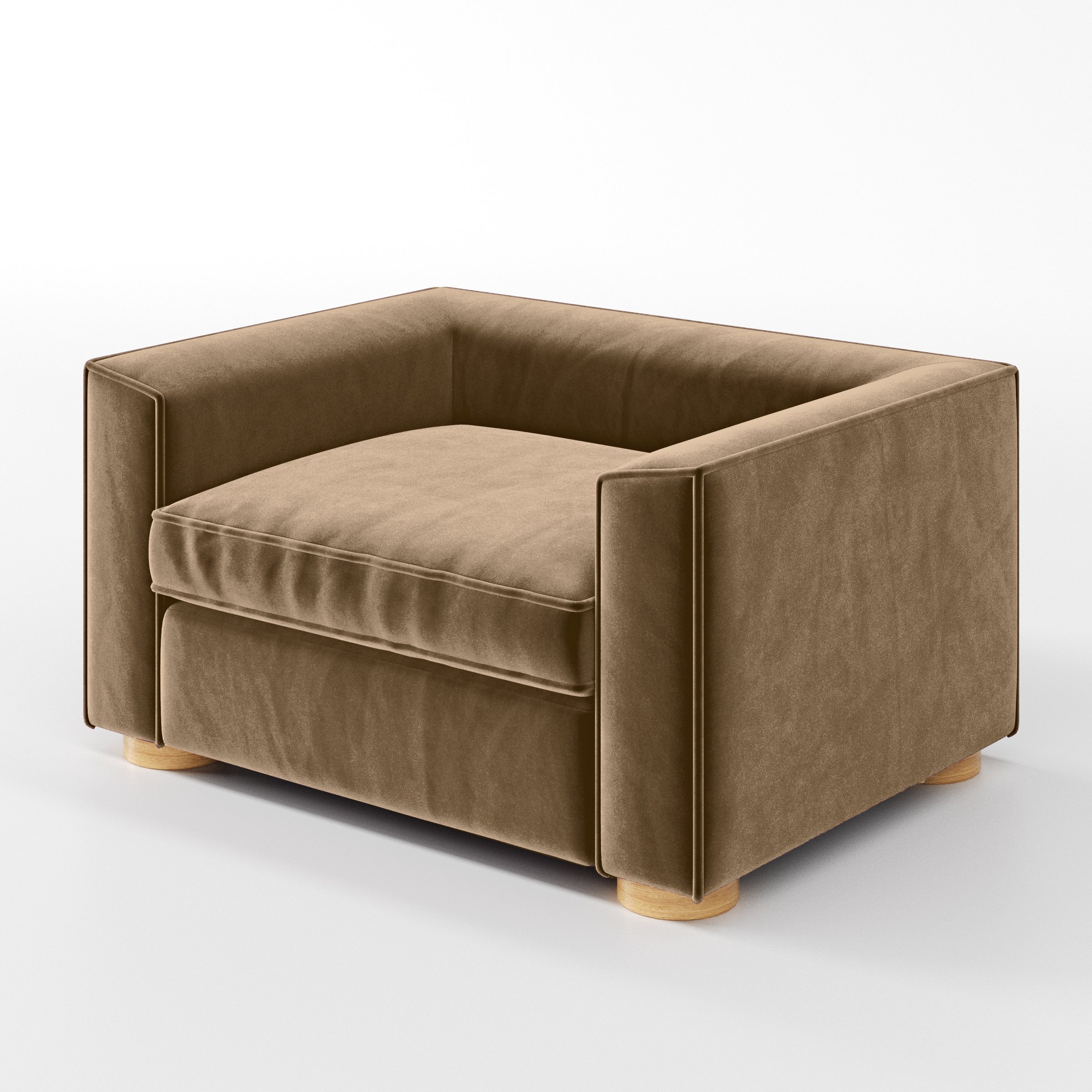 Diagonal view of the Feale armchair upholstered in Plush EasyClean Velvet in Caribou.