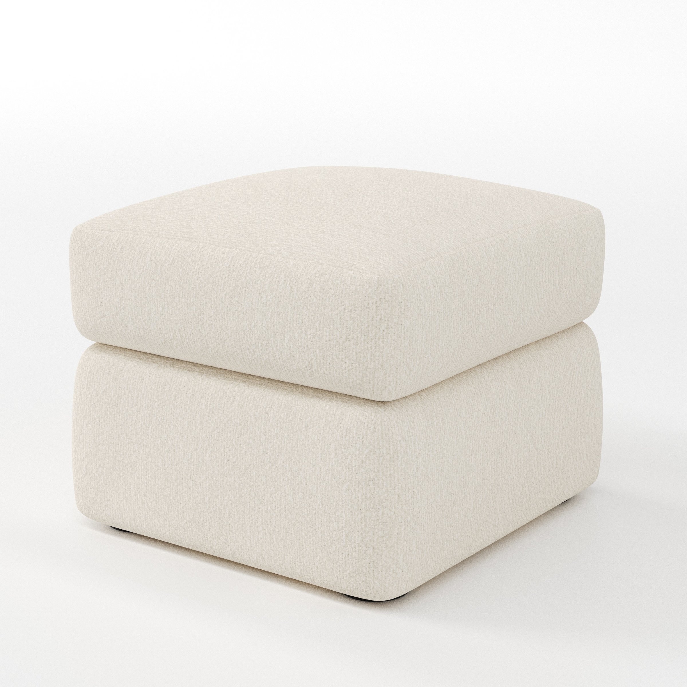 Coniston footstool in Kilda Boucle Cream shown at a diagonal angle highlighting clean lines and deep cushioning.