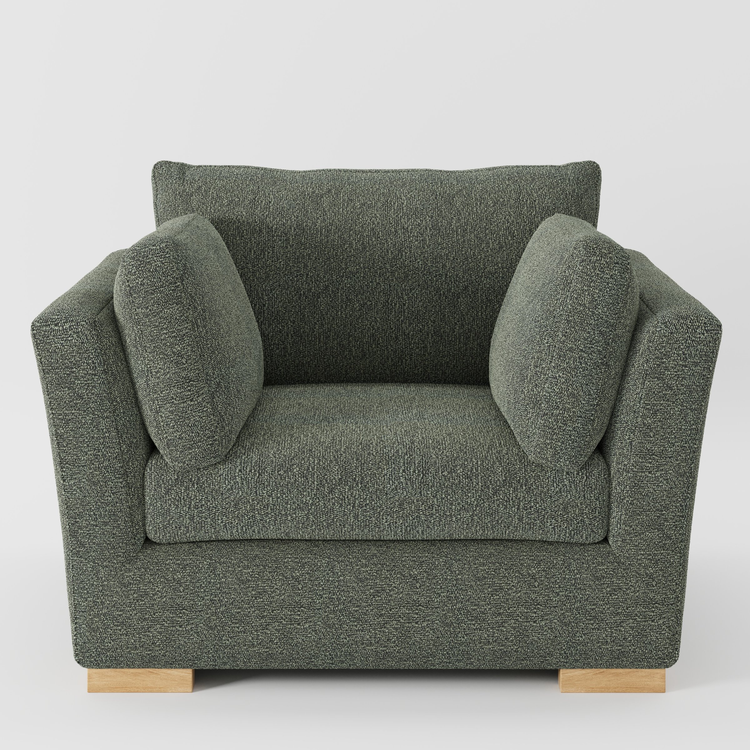 Stowe armchair in Kilda Boucle Moss shown front-on against a neutral studio backdrop.