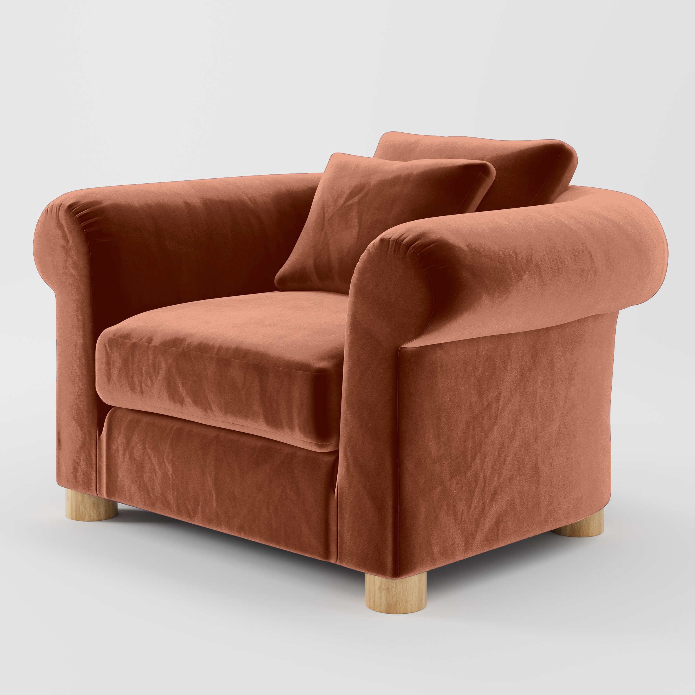 Diagonal view of the Windermere armchair upholstered in Plush EasyClean Velvet in Apricot.