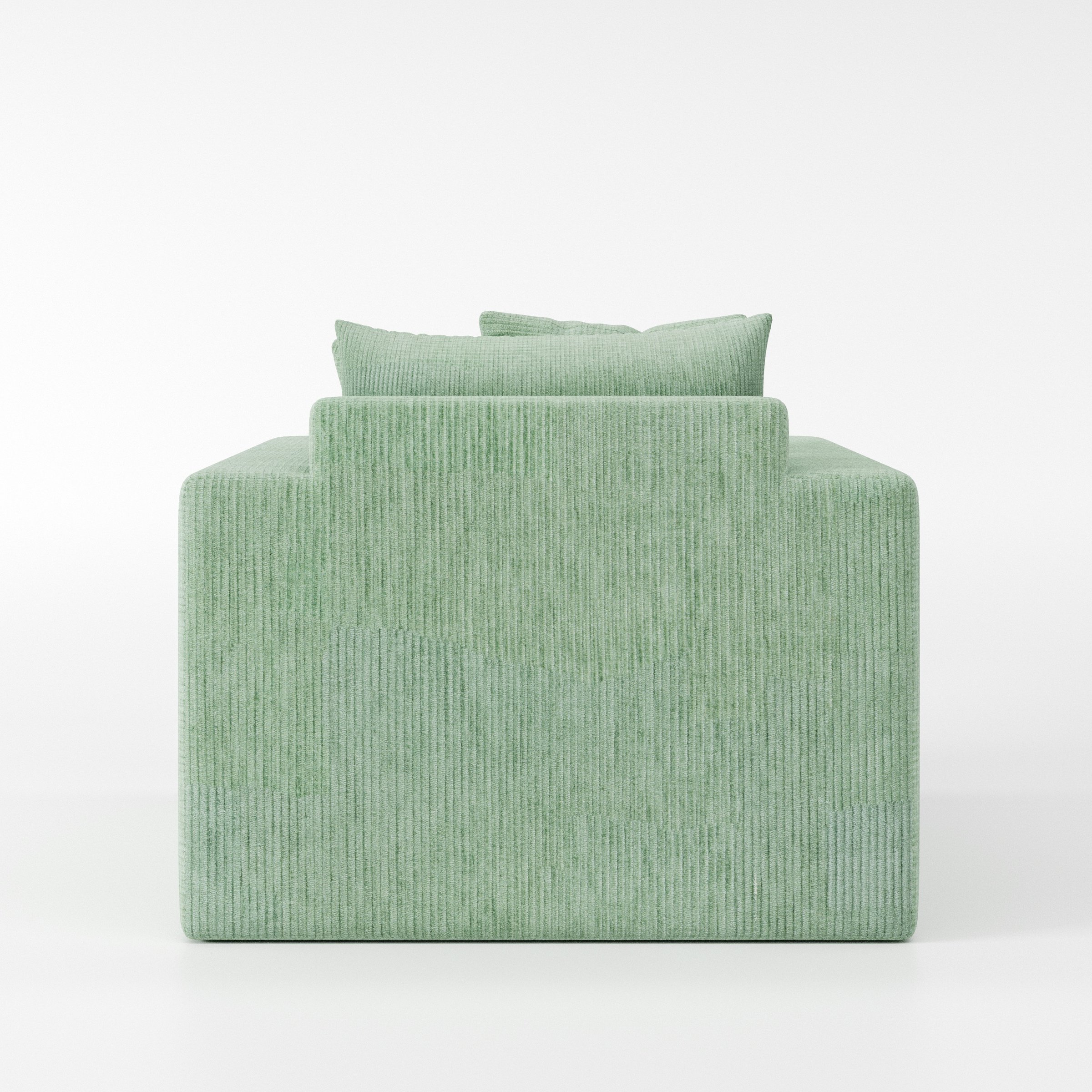 Coniston armchair in Caldey Velvet Corduroy Eucalyptus shown from the rear highlighting backrest shape and upholstery finish.