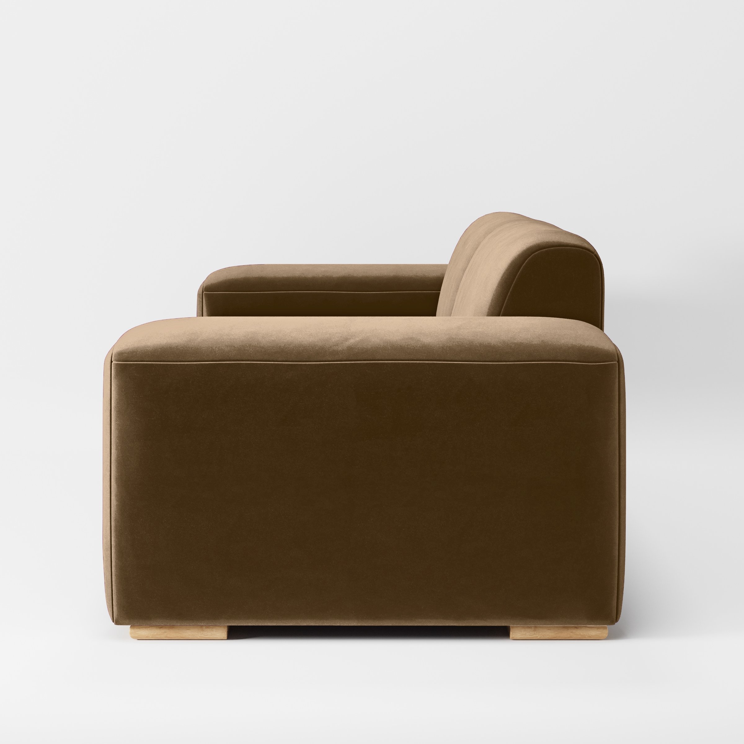 Side view of the Darwell sofa upholstered in Plush EasyClean Velvet in Caribou.