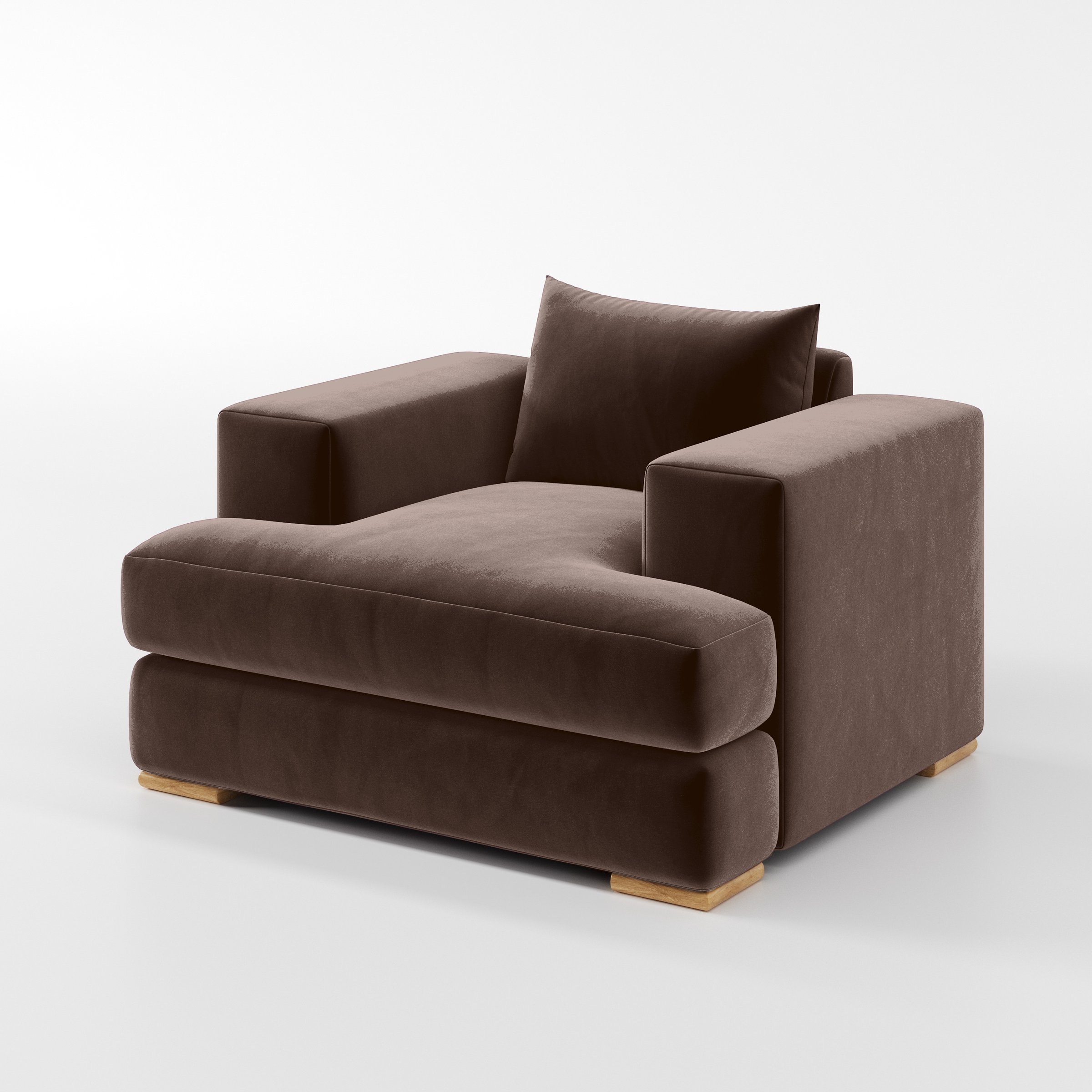 Diagonal view of the Fane armchair upholstered in Plush EasyClean Velvet in Mole.