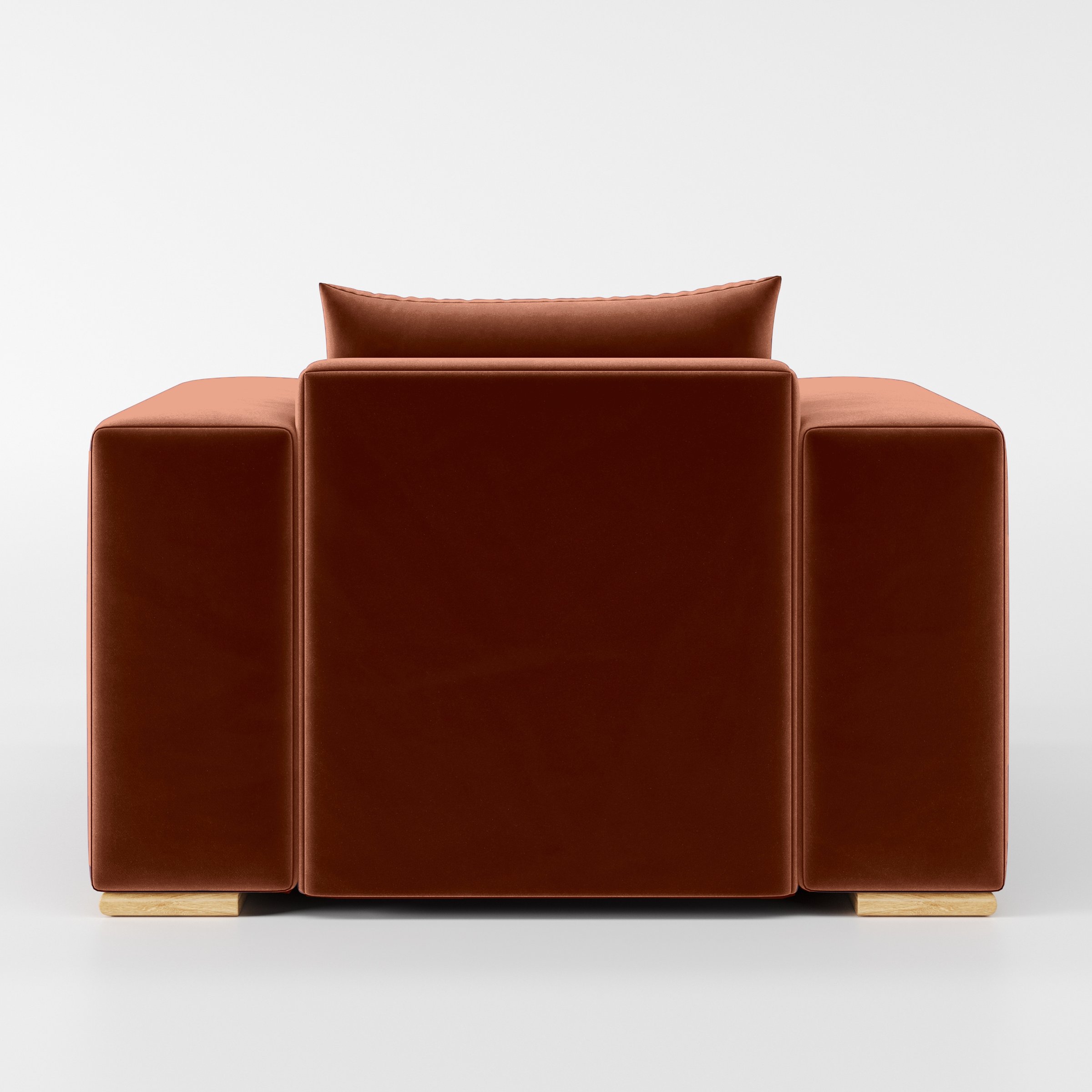 Rear view of the Fane armchair upholstered in Plush EasyClean Velvet in Apricot.