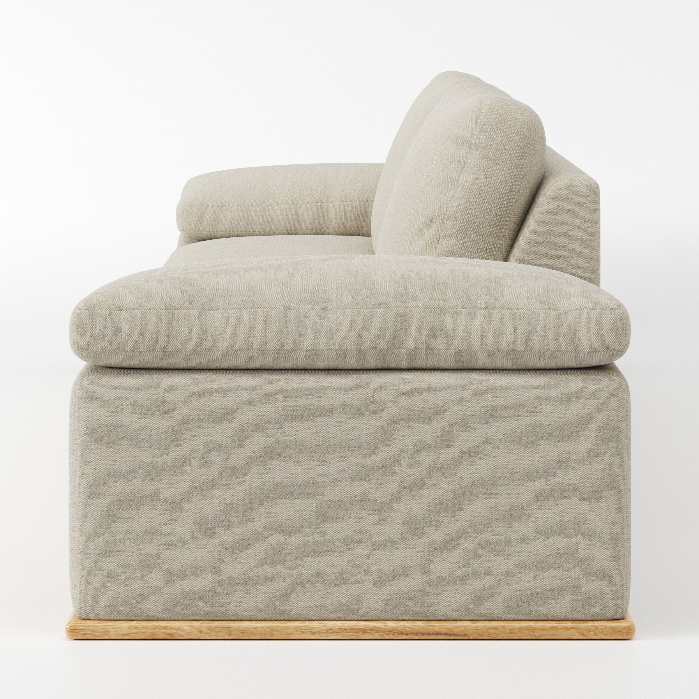 Cusher sofa in Alderney Linen Oatmeal shown in side profile displaying proportions and overall silhouette.